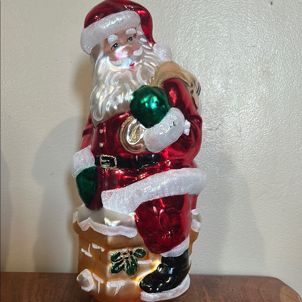 Festive Santa Claus Ornament with Red and Green Accents